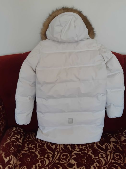 Продам пуховик Reima