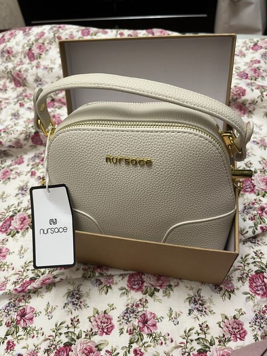 Сумка nursace белая.