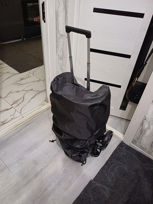 Продаётся фирменный оригинальный чемодан коляска новый