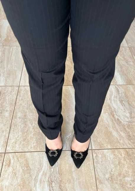 Pantaloni conici din stofa