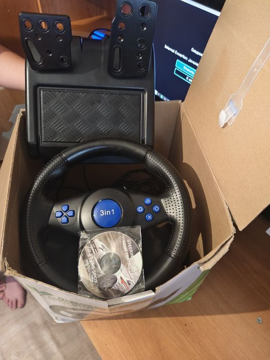 Продам новый игровой руль
