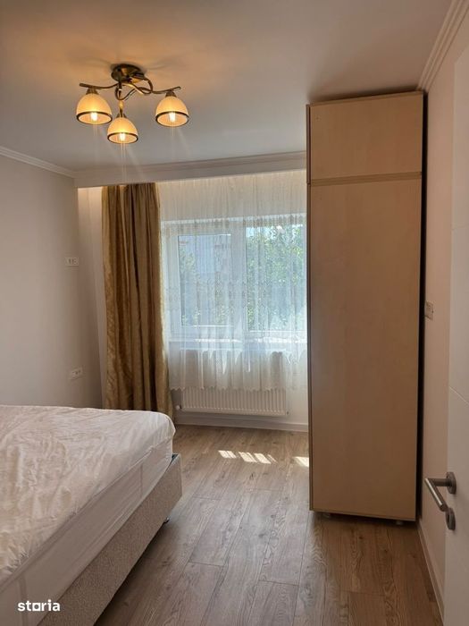 Inchiriere 3 camere, cu loc de parcare, totul nou