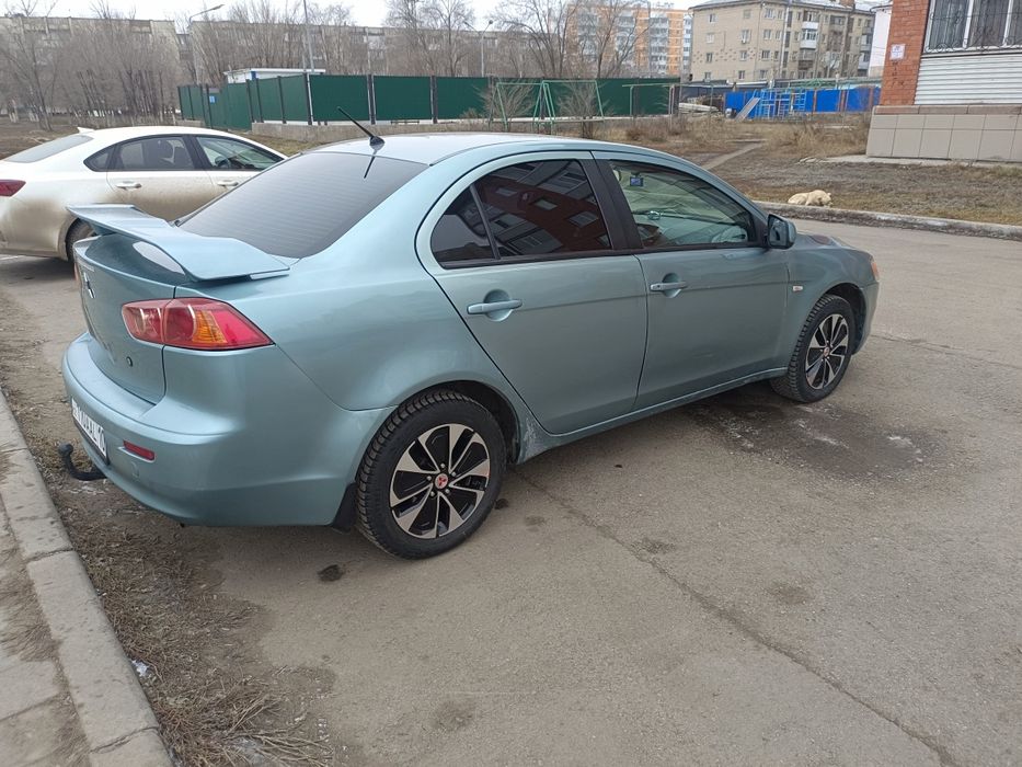 Митсубиси Лансер Х