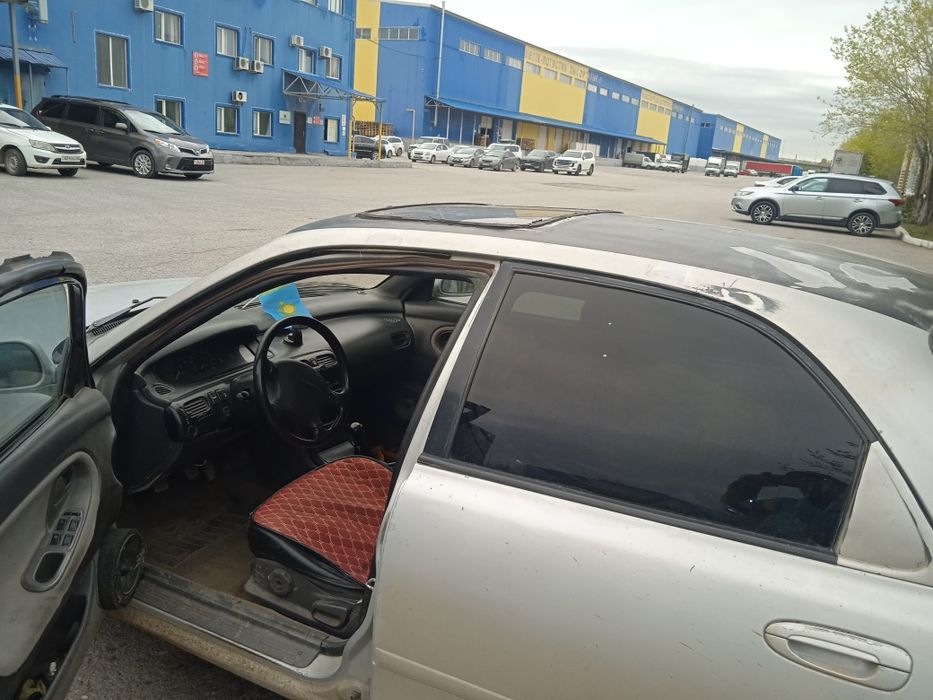 Мазда на ходу сиырға обмен