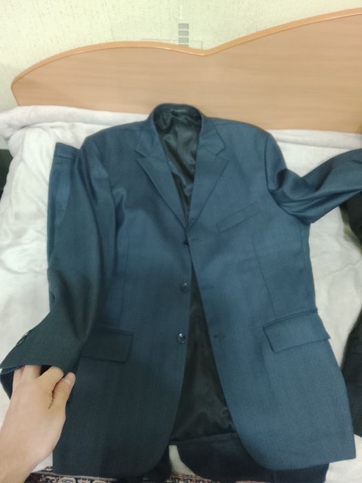 Продам новый костюм