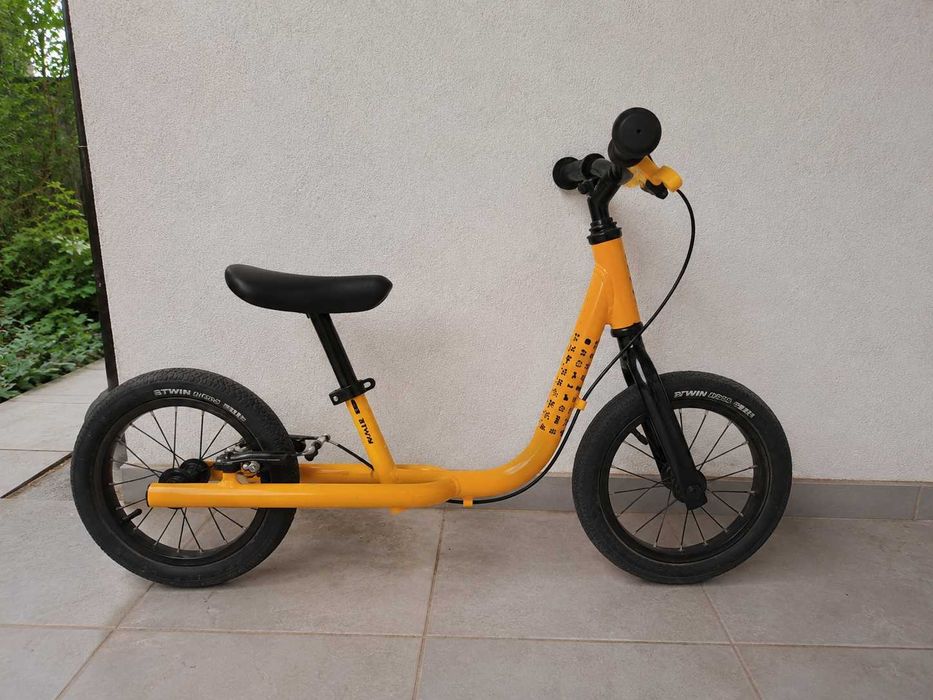 Bicicletă fără pedale DECATHLON galbena copii 85-105 cm - stare excelenta noua