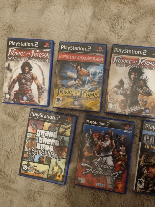 Playstation 2 cu 9 jocuri si controller