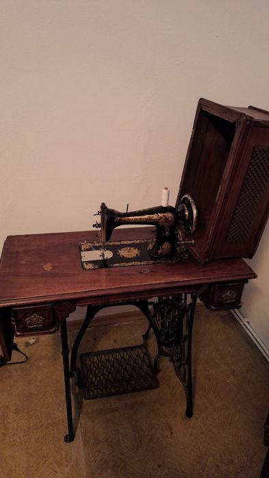 Masina de cusut Singer