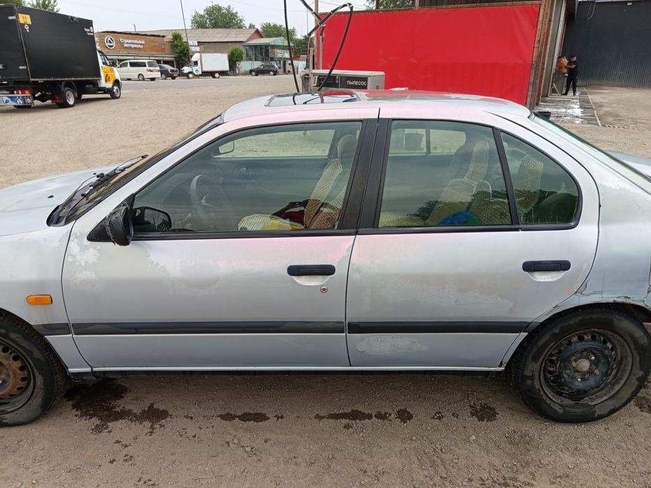 Ниссан примера 1992г.