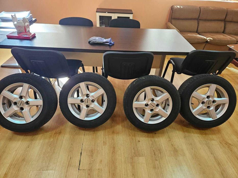 Алуминиеви Джанти с гуми 6Jx14H2 ET38 4x100  централен отвор без фланци 70.1 мм. с фланци 54.1 мм.