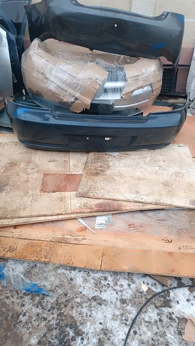 Задний бампер Nissan Almera Classic