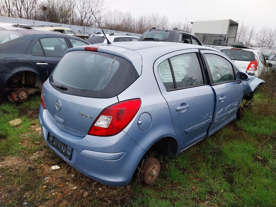 Opel corsa D stopuri hayon bara usi ușa scaune oglinda portbagaj aripa aripi Oglinzi armatura bara capota faruri far cutie viteze motor alternator