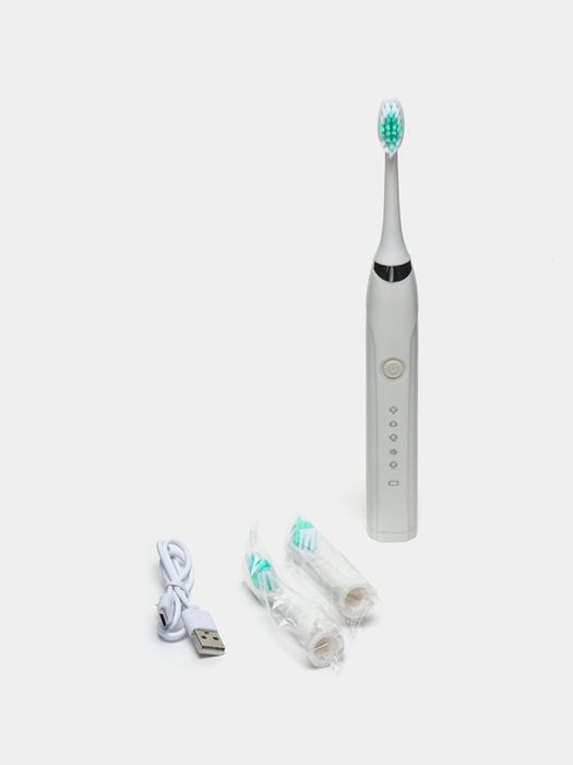 Электрическая зубная щетка