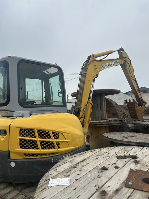 Se vinde  New Holland e 50 2 sr