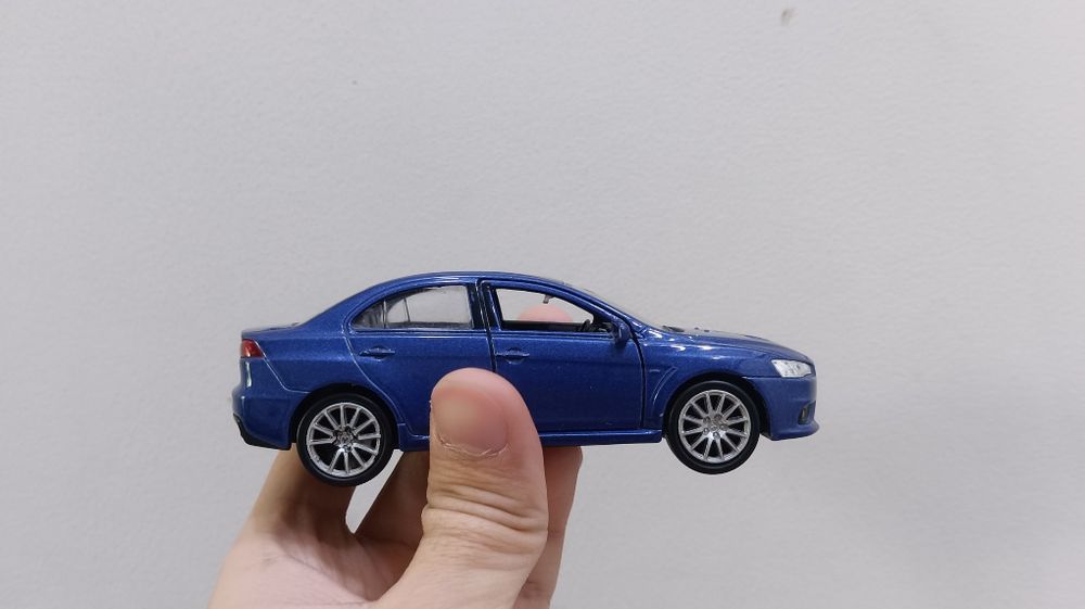 Welly diecast модель Mitsubishi Lancer Evolution X