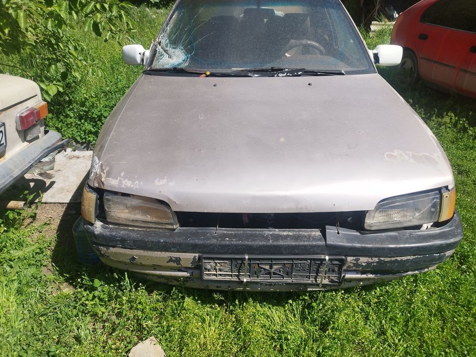 Мазад 323  на ходу