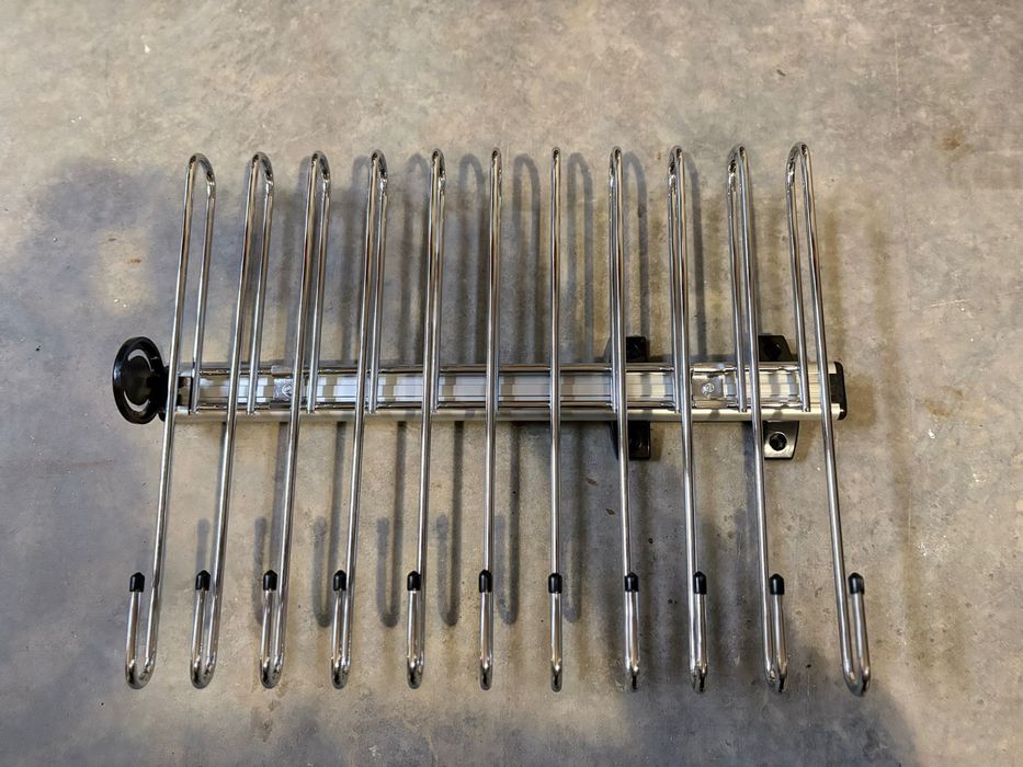 Изтеглящ механизъм за панталони