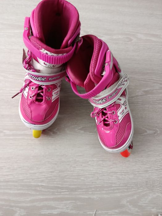 Роликовые коньки