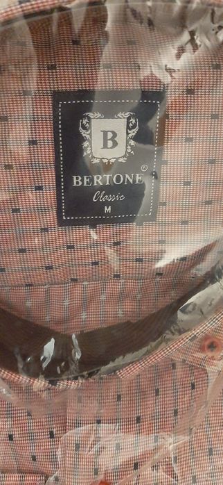 Рубашки мужские новые