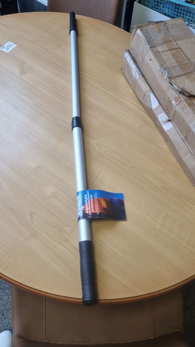 Bat extensibil pentru racleta