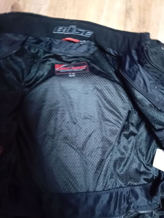 Част от  моториски  костюм-яке