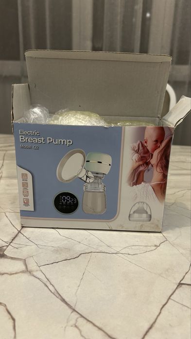 Молокоотсос (электрическая)