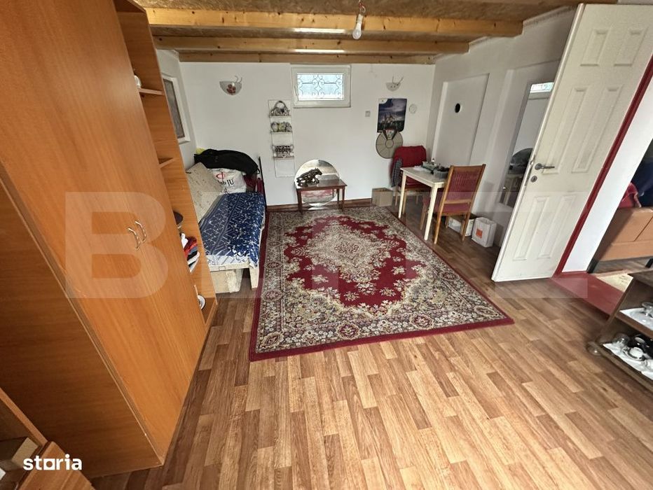 Apartament de locuit + atelier auto + terasa si curte generoasa