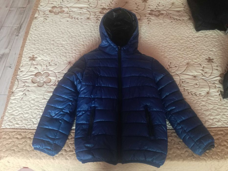 Продавам светло синьо детско зимно яке-DONG