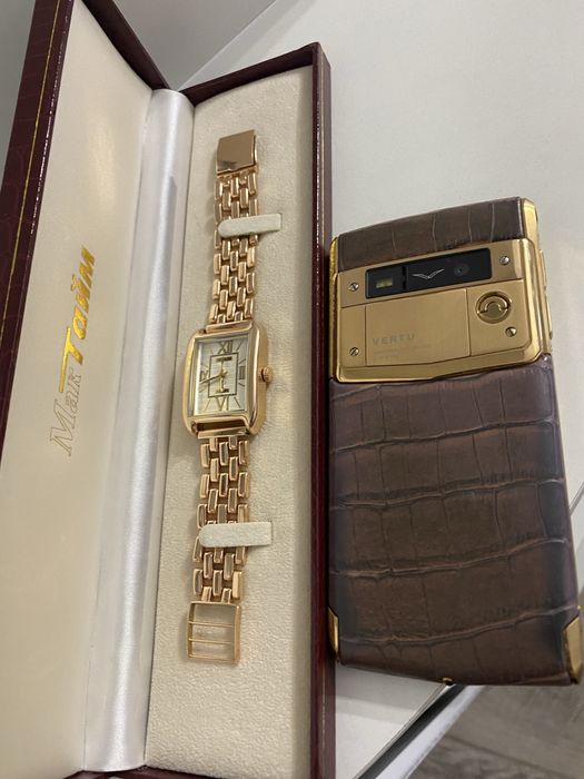 Золотые часы Мактайм