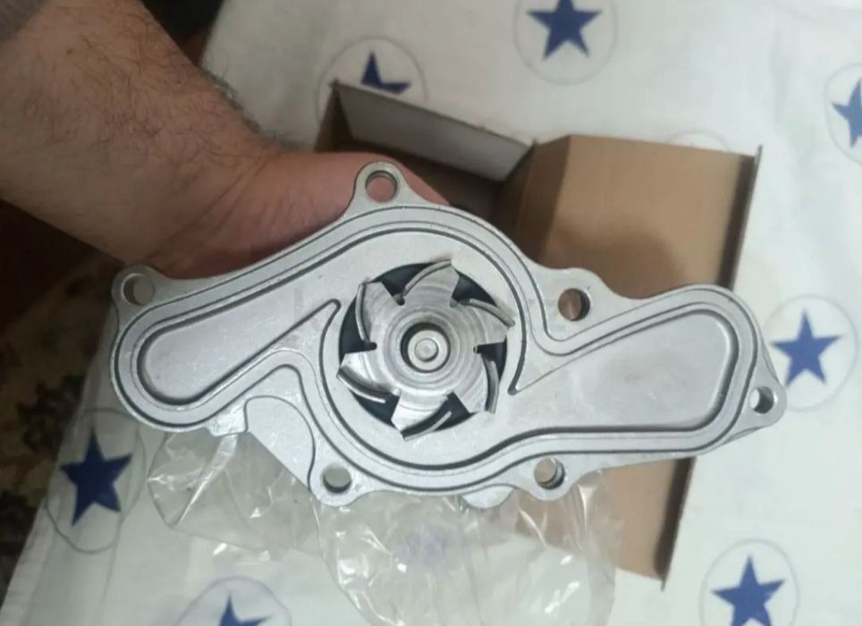 Помпа Mazda Cronos