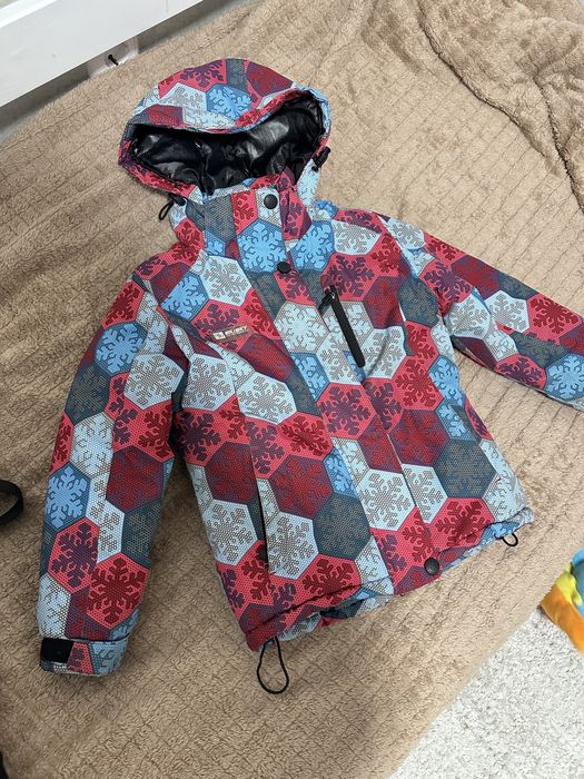 Продам  зимний комбинезон на мальчика или девочку