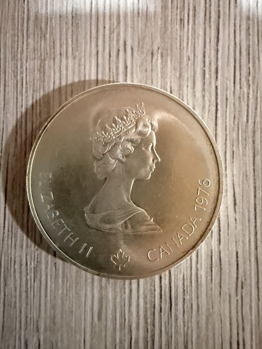 “Flacara Olimpica” moneda de 5 dolari din 1976 de la olimpiada de vara