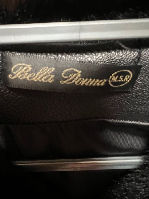 Жилетка женская в отличном состоянии