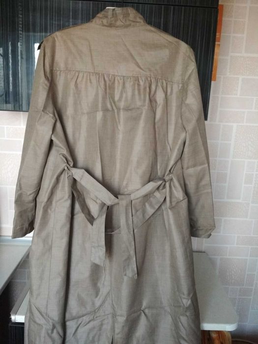 Женская одежда. Плащ