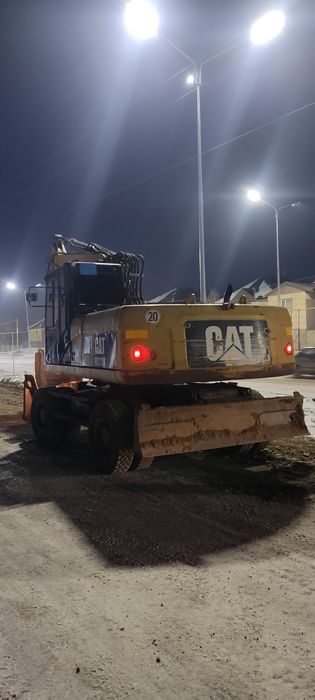 Услуга Колесны Экскаватор в Астане