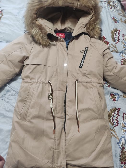Продам парку на девочку 152 см
