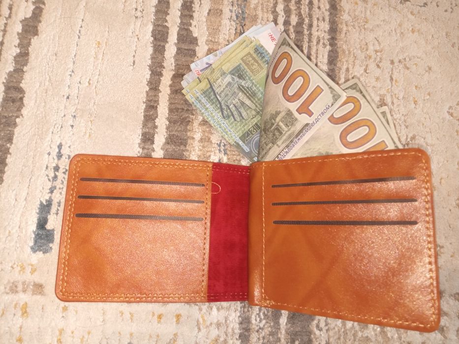 Продам Новое  партмоне с рисункок 100$