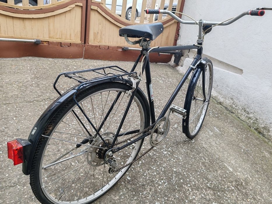 Bicicletă semicursieră Pegas 2128 Torpedo și o șa și ghidon