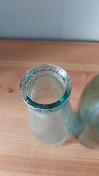 Бутылки молочные