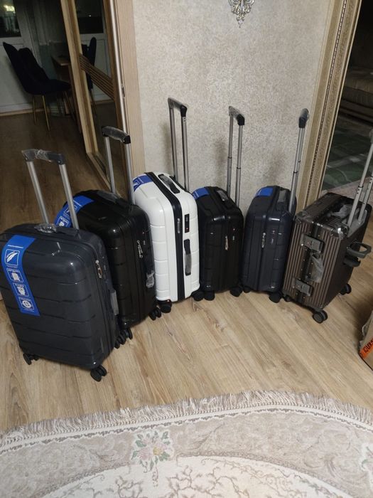 Новые чемоданы разных размеров