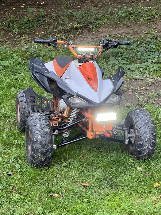 Vând atv de copii de 125 cm automat merge bine trage bine