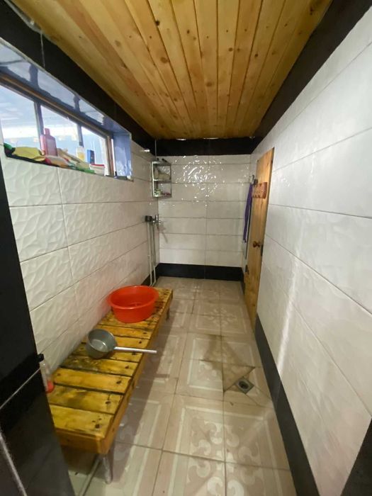 Дом, улица Калиева, Танат Империя