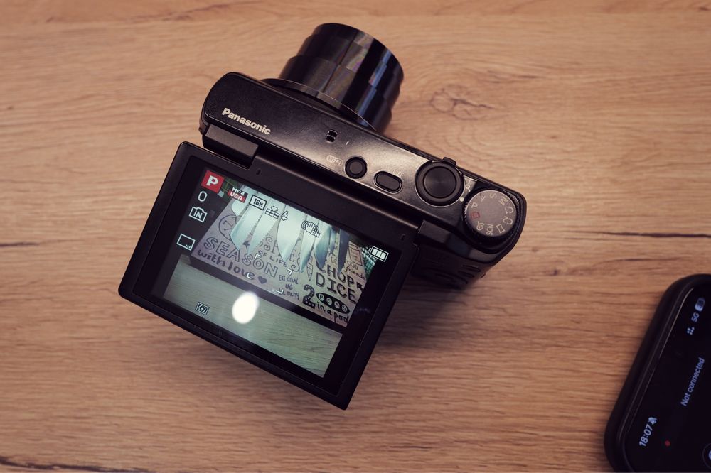 Aparat foto Panasonic Lumix TZ55 cu WiFi de Top ecran rabatabil Leica