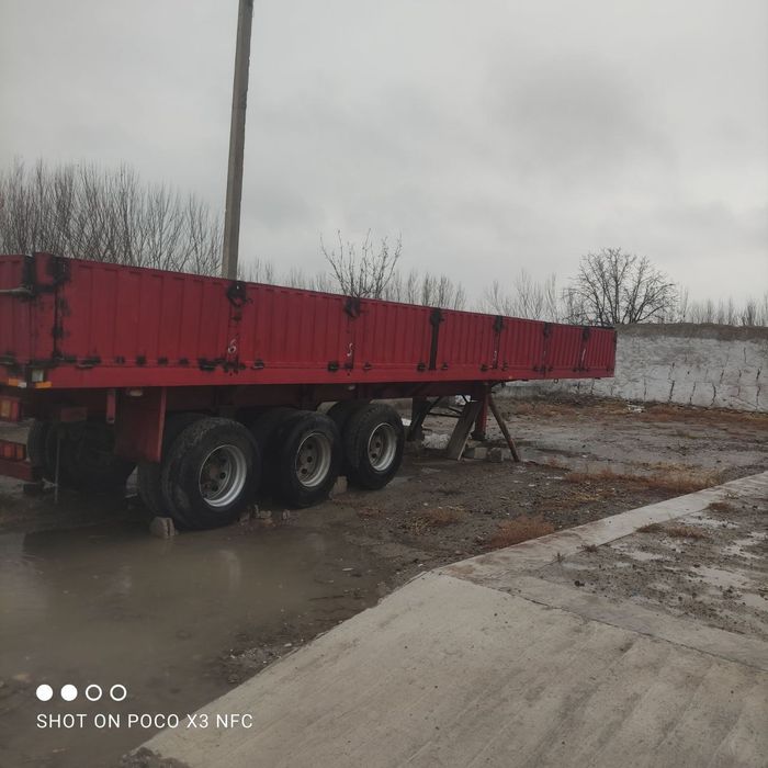 60 контейнеровоз прицеп сотилади