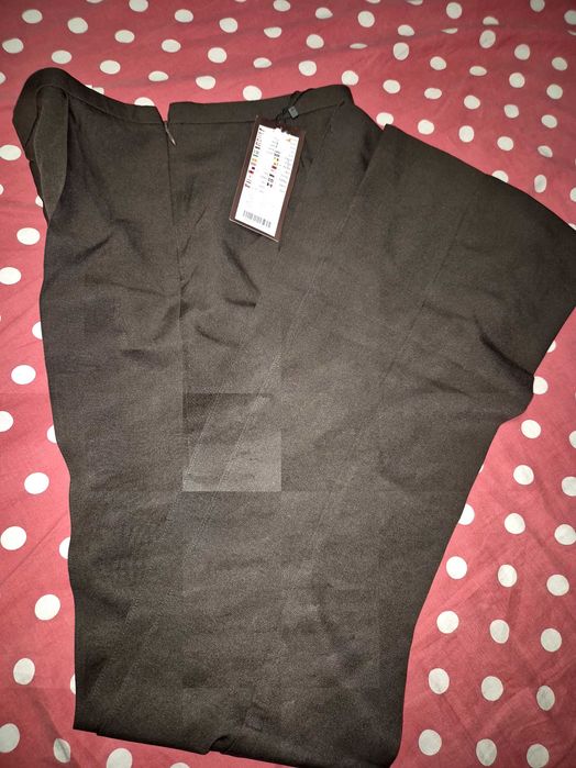 Pantaloni evazati cu eticheta