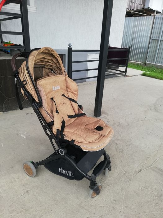 Детская прогулочная коляска