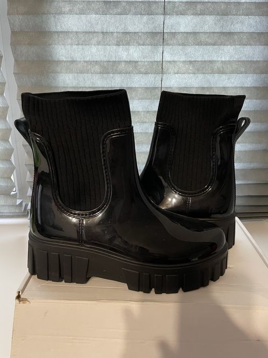новые сапоги резиновые