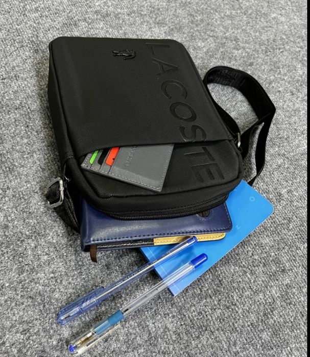 Барсетка от бренда Lacoste