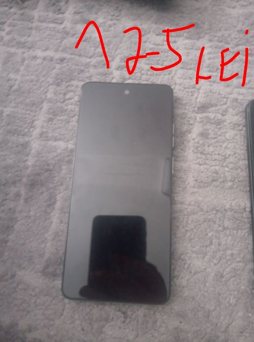 Vand telefoane pentru reparat