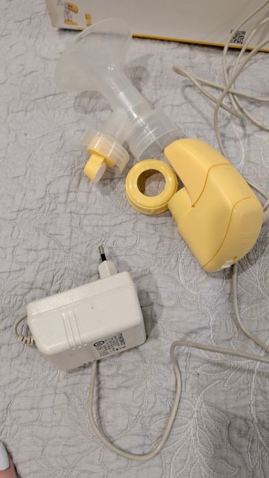 Продам электрический молокоотсос